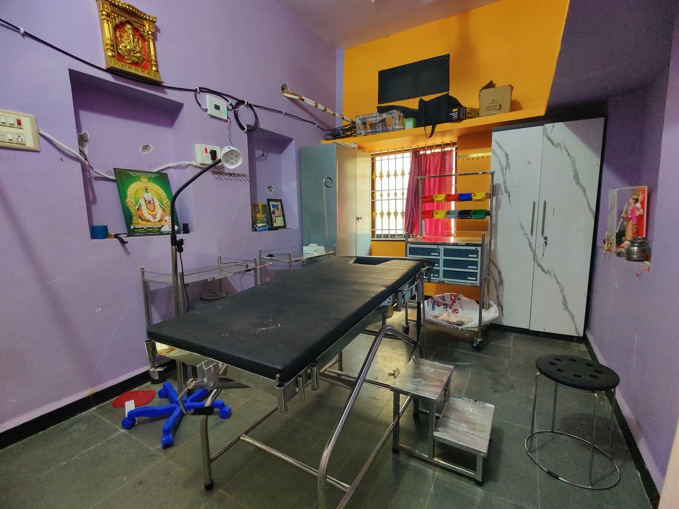 Minor operation theatre with procedure table at Mahalakshmi Hospital